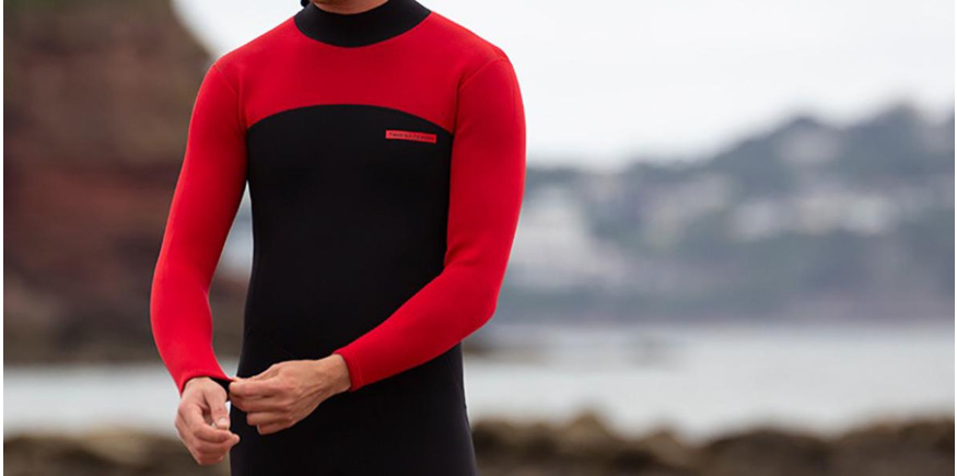 wearing a wetsuit at the beach