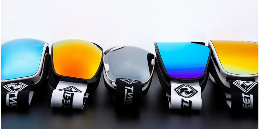 ski goggles lens types lined up in the studio