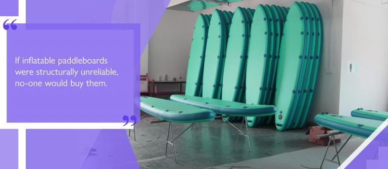 Inflatable SUP boards on display in a retail environment