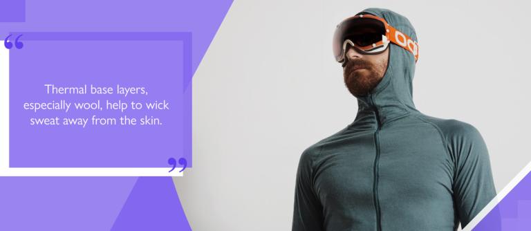 Snowboarder dressed in hooded base layer