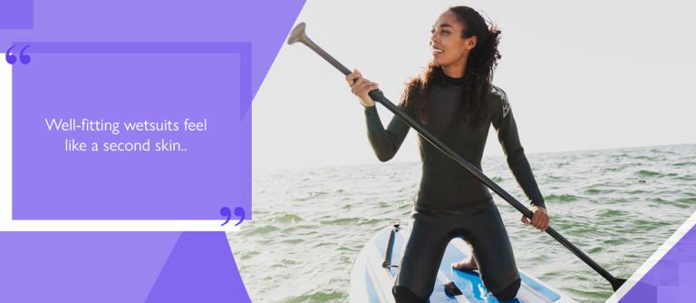 a paddler crouching in a well-fitting wetsuit