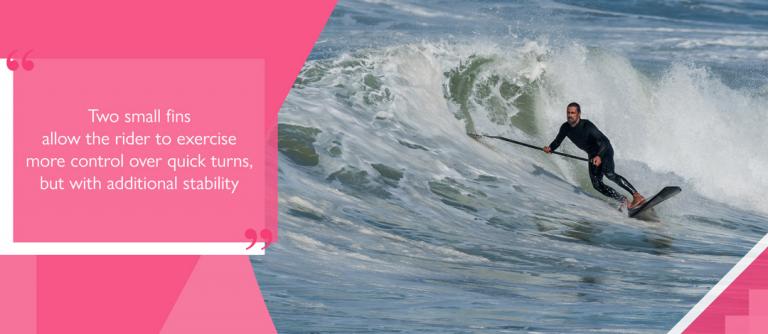 Paddler executing turn on surf SUP