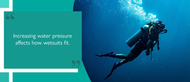 Diver scuba diving in deep water