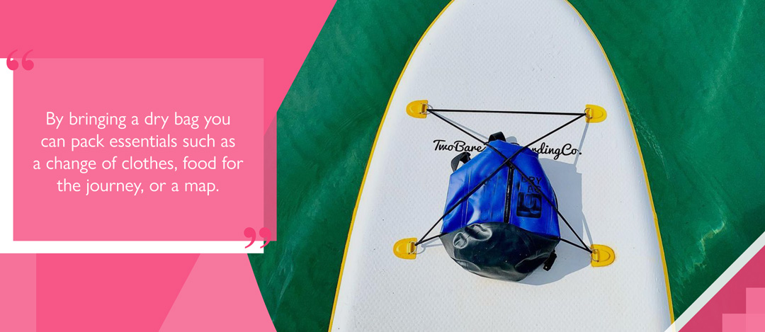 a dry bag on a paddleboard with text reading 'By bringing a dry bag you can pack essentials such as a change of clothes, food for the journey, or a map'