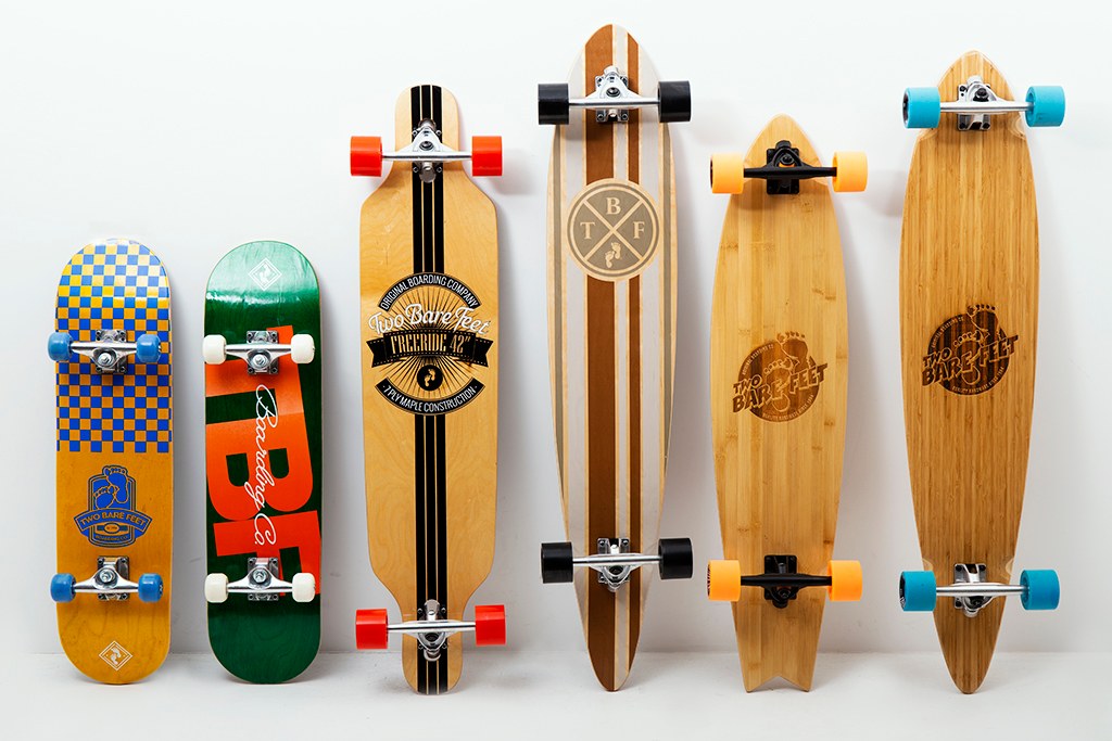 lineup of skateboards and longboard types
